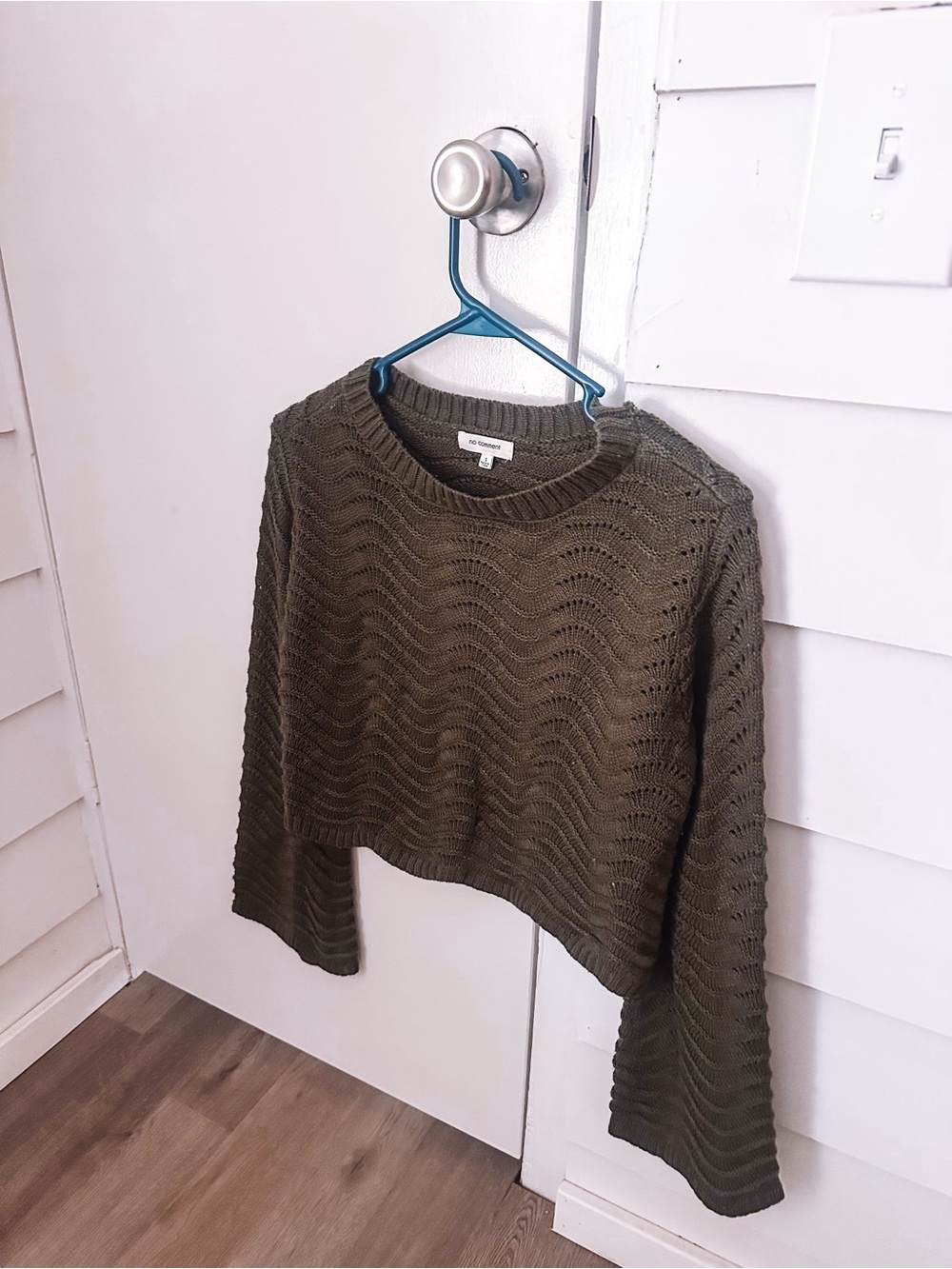 green knit top